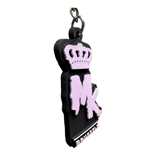 Porte-clés MK Brussels Magic King noir avec logo en relief et couronne