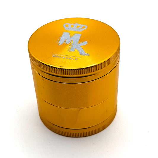 Grinder Magic King gold 4 pièces avec gravure MK et système à pollen